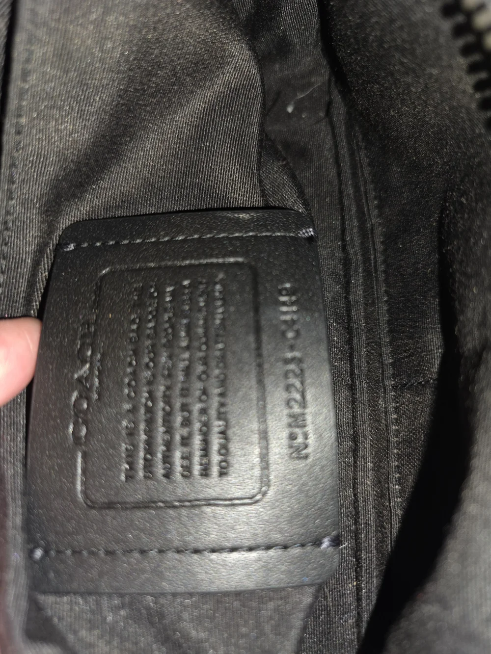 Coach Graham Crossbody bag in Charcoal Black signature coated canvas.